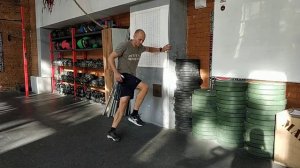 Подсед-толчок с упором в стену скрестно