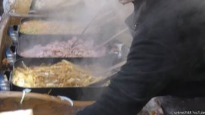 Street Food in Krakow, Poland. Yummy Overloaded Grilled Bread. Christmas Market