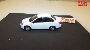 Распаковка машинок ЛАДА ГРАНТА LADA GRANTA обзор модельки от Welly