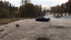 Audi S4 C4 2.2 turbo quattro drift in a parking lot