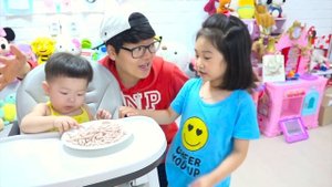 Boram take care of baby and play with color stacking rings