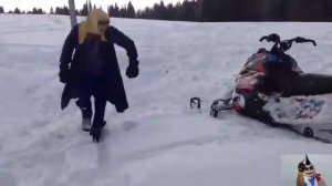 Бабка на снегоходе