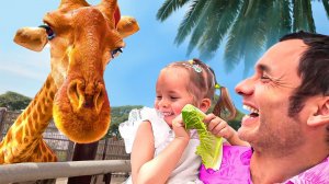 Maya and Mary feed the animals in Safari park
