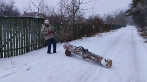 Волокуша по насту, тяну бревно одним мизинцем!