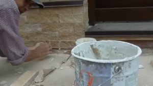 Облицовка цоколя забора цокольной плиткой.  Завершение.