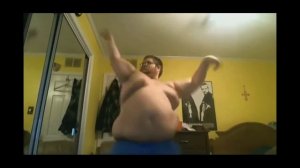 Жирный мужик танцует под "Великий и уникальный "