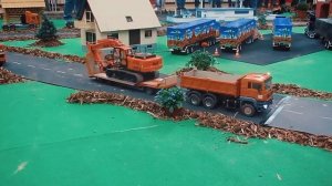 RC Truck Trial and RC Scale Trail Trucks or Scale RC Unimog with RC Bagger and RC Cars