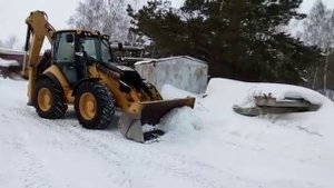 Погрузчик экскаватор CAT 434E 2011 года. чистка снега