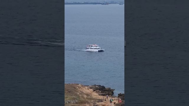 Trimaran Super Yacht Crusing along Magellan Bay, Punta Engano, Philippines