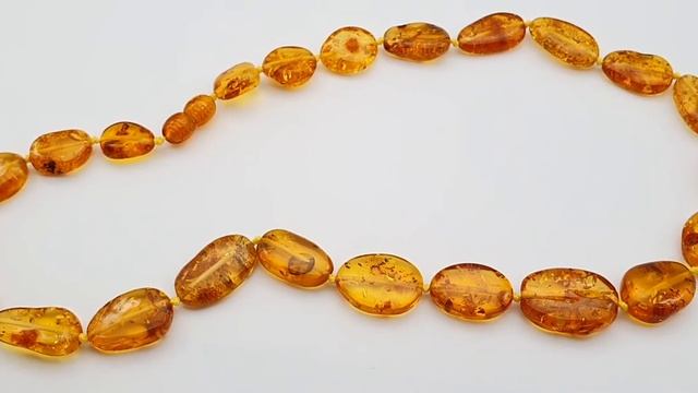 Янтарные бусы Солнечный камень. Украшения из балтийского янтаря. Бусы из янтаря. Видео-обзор на бус смотреть онлайн