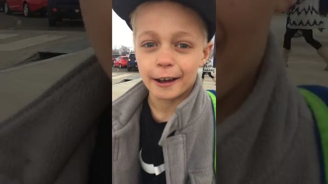 Ruffles kid tells people how to put a hat on