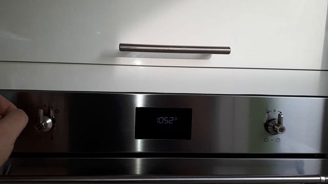 Smeg oven clock setting for model SF6372x