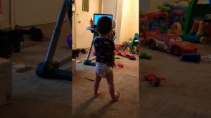 Leo Messing With His Packed Diaper