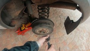 how to adjust opel corsa rear brakes