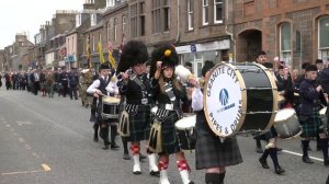 Massed Bands lead the parade through Stonehaven in Scotland marching to War Memorial Commemoration