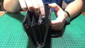 Модель кожаного кошелька ручной работы.
