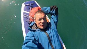 В сухом гидрокостюме на сапе