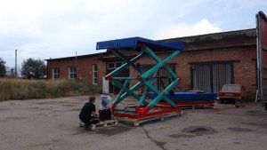 Электрогидравлические подъёмные столы ножничного типа