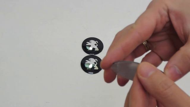 Наклейка OR-4 "PEUGEOT" на автомоб, колпаки, диски, пластик/ комп. 4шт. смотреть онлайн