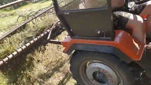 Гребем сено минитрактор Уралец 180