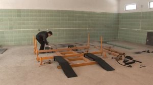 устройство для правки кузова автомобиля по патенту №9503 РК