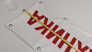Установка люверсов на баннере