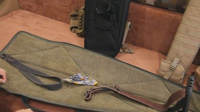 Чехлы для переноски и транспортировки оружия.