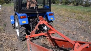 Картофелекопалка однорядная WIRAX и Минитрактор ДТЗ 244.4С