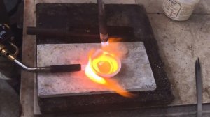 melting 4 oz of Canadian maple leaf gold coin with propane torch