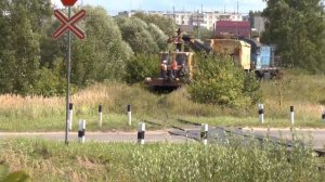 Тепловоз ТГМ4Б-0014 с краном и грузовой дрезиной АГМ-7552