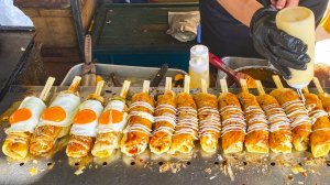 Хашимаки окономияки на палочках — Японская уличная еда.