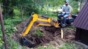 Миниэкскаватор J8 корчевание пня.