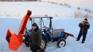 Японский минитрактор ISEKI TL-1900 со  шнекороторным снегоуборщиком