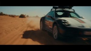 Olympic Gold Medalist Skier v Sand Dunes – Porsche 911 Dakar