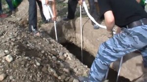 Захоронение Артема Карлышева после эксгумации