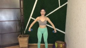 Разведение рук в стороны с гантелями и подъем гантелей перед собой