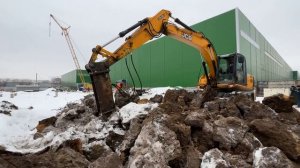 Работа колесного экскаватора JCB JS160w с гидромолотом, пробивает промерзлый грунт 1 метр ООО "АСС"