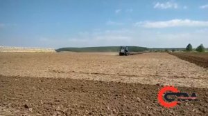 Предпосевная культивация трактором Т-150 ХТЗ после капремонта произведенного в ГК СТМ.
