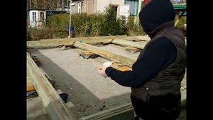 Обвязка каркасного дома на фундаменте из покрышек.