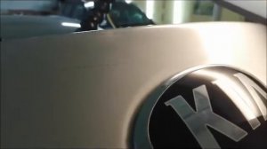 Киа Рио  Ремонт вмятины на багажнике без покраски