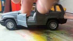 Джип гранд чероки 1 поколения 1:36 (зелёный)