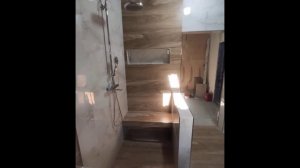 Закончена отделка ванной комнаты широкоформатной плиткой в коттедже города Краснодара