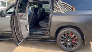 Cadillac Escalade - сдвинуть второй ряд сидений