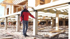 Дом из бруса на ЖБ сваях