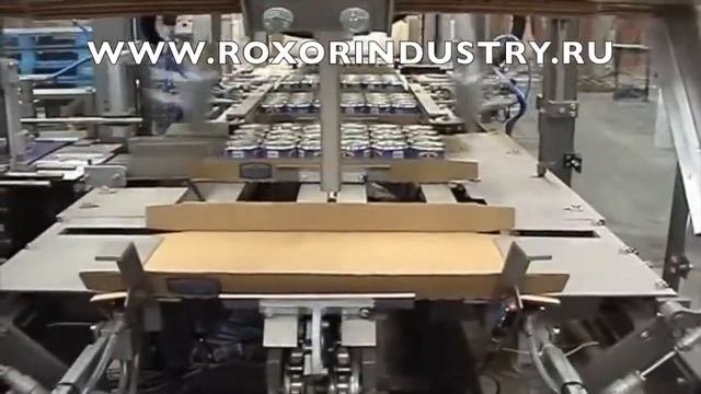 Упаковка продукции в банках в картонную упаковку