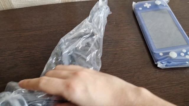 Распаковка /Unpacking Nintendo Switch Lite.
