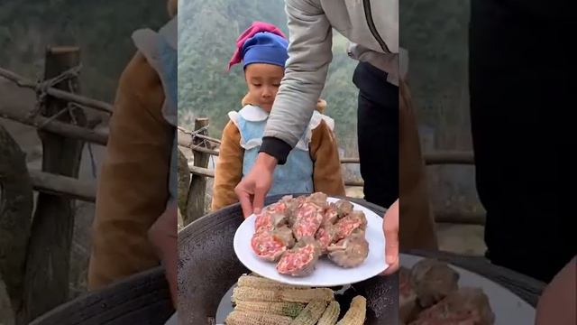 Chinese Father and cute son cooking and eating together in countryside смотреть онлайн