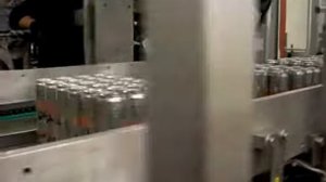 Линия упаковки банок и бутылок в картонные коробки