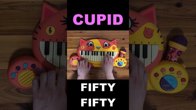 Fifty Fifty Cupid on Cat Piano