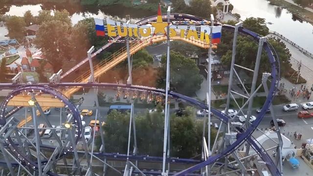 Аттракцион "Evro Star" с Колеса обозрения на закате смотреть онлайн